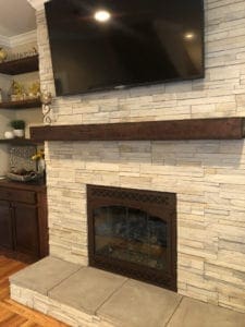 gas fireplace conversion with Peterson Gas log set